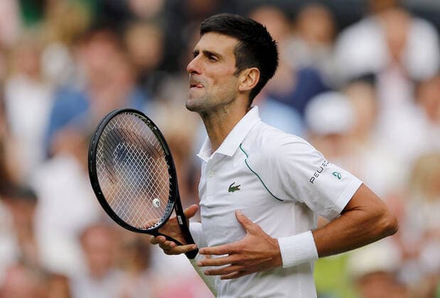 Mandatory Credit: Photo by Shutterstock (12202161bj) Novak Djokovic of Serbia celebrates Wimbledon Tennis Championships, Day 11, The All England Lawn Tennis and Croquet Club, London, UK - 09 Jul 2021 Wimbledon Tennis Championships, Day 11, The All England Lawn Tennis and Croquet Club, London, UK - 09 Jul 2021  Copyright: xShutterstockx 12202161bj