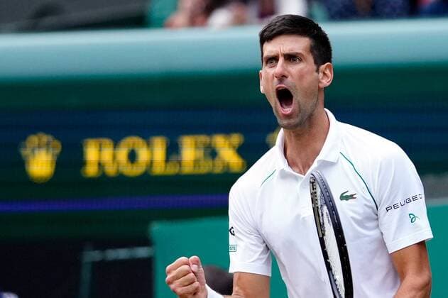 Mandatory Credit: Photo by Shutterstock (12202136fs) Novak Djokovic celebrates during his semi-final match Wimbledon Tennis Championships, Day 11, The All England Lawn Tennis and Croquet Club, London, UK - 09 Jul 2021 Wimbledon Tennis Championships, Day 11, The All England Lawn Tennis and Croquet Club, London, UK - 09 Jul 2021  Copyright: xShutterstockx 12202136fs