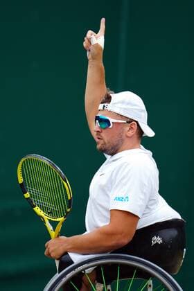 Mandatory Credit: Photo by Javier Garcia Shutterstock (12203621ai) Dylan Alcott celebrates during the Quad Wheelchair Singles final Wimbledon Tennis Championships, Day 12, The All England Lawn Tennis and Croquet Club, London, UK - 10 Jul 2021 Wimbledon Tennis Championships, Day 12, The All England Lawn Tennis and Croquet Club, London, UK - 10 Jul 2021  Copyright: xJavierxGarcia Shutterstockx 12203621ai