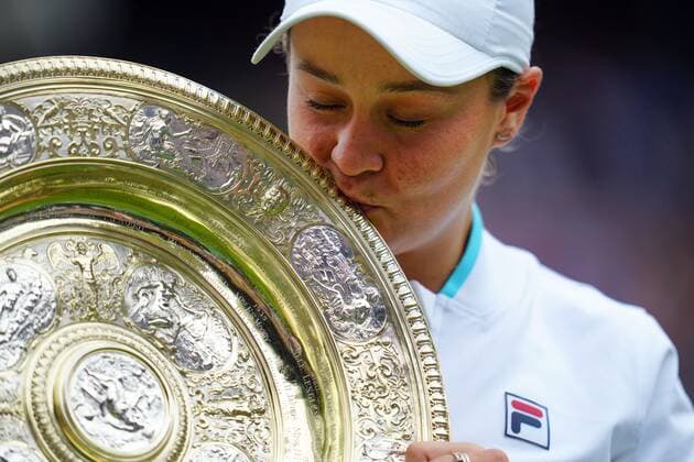 Mandatory Credit: Photo by Javier Garcia Shutterstock (12203621gu) Ashleigh Barty kisses the Venus Rosewater Dish after victory in the Ladies SIngles final Wimbledon Tennis Championships, Day 12, The All England Lawn Tennis and Croquet Club, London, UK - 10 Jul 2021 Wimbledon Tennis Championships, Day 12, The All England Lawn Tennis and Croquet Club, London, UK - 10 Jul 2021  Copyright: xJavierxGarcia Shutterstockx 12203621gu