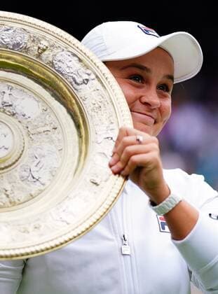 Mandatory Credit: Photo by Javier Garcia Shutterstock (12203621hg) Ashleigh Barty celebrates with the Venus Rosewater Dish after victory in the Ladies SIngles final Wimbledon Tennis Championships, Day 12, The All England Lawn Tennis and Croquet Club, London, UK - 10 Jul 2021 Wimbledon Tennis Championships, Day 12, The All England Lawn Tennis and Croquet Club, London, UK - 10 Jul 2021  Copyright: xJavierxGarcia Shutterstockx 12203621hg