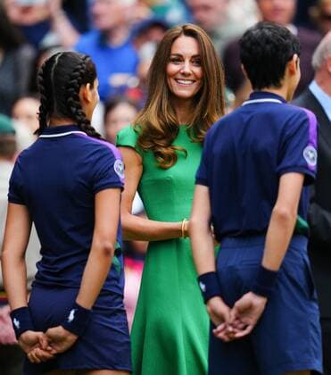 Mandatory Credit: Photo by Javier Garcia Shutterstock (12203621fv) Catherine Duchess of Cambridge chatting with ballboys and ball girls on Centre Court before the trophy presentation Wimbledon Tennis Championships, Day 12, The All England Lawn Tennis and Croquet Club, London, UK - 10 Jul 2021 Wimbledon Tennis Championships, Day 12, The All England Lawn Tennis and Croquet Club, London, UK - 10 Jul 2021  Copyright: xJavierxGarcia Shutterstockx 12203621fv