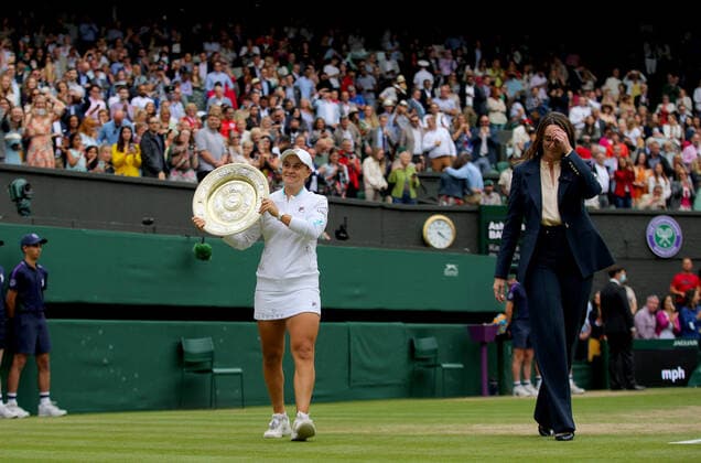 Mandatory Credit: Photo by Shutterstock (12203623ag) Ashleigh Barty of Australia parades with the trophy Wimbledon Tennis Championships, Day 12, The All England Lawn Tennis and Croquet Club, London, UK - 10 Jul 2021 Wimbledon Tennis Championships, Day 12, The All England Lawn Tennis and Croquet Club, London, UK - 10 Jul 2021  Copyright: xShutterstockx 12203623ag
