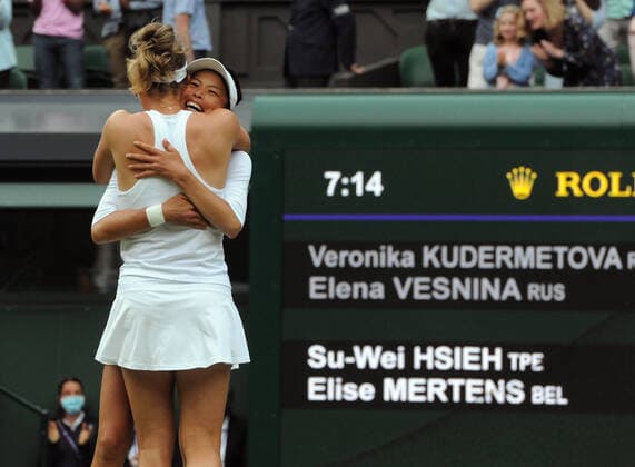 Lawn Tennis - 2021 All England Championships - Woman™s Doubles Final - Wimbledon Veronika Kudermetova and Elena Vesnina (Russia) v Su - Wei Hsieh and Elise Mertens Su - Wei Hsieh and Elise Mertens celebrate after winning match point 