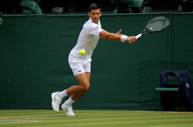 Mandatory Credit: Photo by Shutterstock (12204580s) Novak Djokovic of Serbia in action Wimbledon Tennis Championships, Day 13, The All England Lawn Tennis and Croquet Club, London, UK - 11 Jul 2021 Wimbledon Tennis Championships, Day 13, The All England Lawn Tennis and Croquet Club, London, UK - 11 Jul 2021  Copyright: xShutterstockx 12204580s