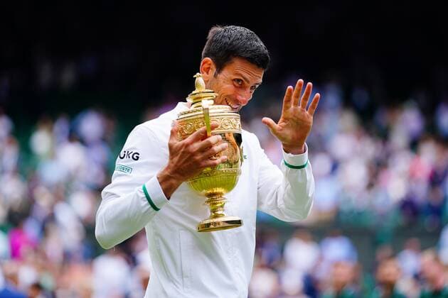 Mandatory Credit: Photo by Javier Garcia Shutterstock (12204578gj) Novak Djokovic celebrates with the trophy after victory in the Gentlemen s Singles final Wimbledon Tennis Championships, Day 13, The All England Lawn Tennis and Croquet Club, London, UK - 11 Jul 2021 Wimbledon Tennis Championships, Day 13, The All England Lawn Tennis and Croquet Club, London, UK - 11 Jul 2021  Copyright: xJavierxGarcia Shutterstockx 12204578gj