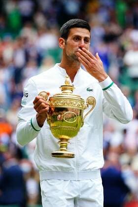 Mandatory Credit: Photo by Javier Garcia Shutterstock (12204578gw) Novak Djokovic celebrates with the trophy after victory in the Gentlemen s Singles final Wimbledon Tennis Championships, Day 13, The All England Lawn Tennis and Croquet Club, London, UK - 11 Jul 2021 Wimbledon Tennis Championships, Day 13, The All England Lawn Tennis and Croquet Club, London, UK - 11 Jul 2021  Copyright: xJavierxGarcia Shutterstockx 12204578gw