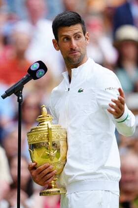 Mandatory Credit: Photo by Javier Garcia Shutterstock (12204578gs) Novak Djokovic celebrates with the trophy after victory in the Gentlemen s Singles final Wimbledon Tennis Championships, Day 13, The All England Lawn Tennis and Croquet Club, London, UK - 11 Jul 2021 Wimbledon Tennis Championships, Day 13, The All England Lawn Tennis and Croquet Club, London, UK - 11 Jul 2021  Copyright: xJavierxGarcia Shutterstockx 12204578gs