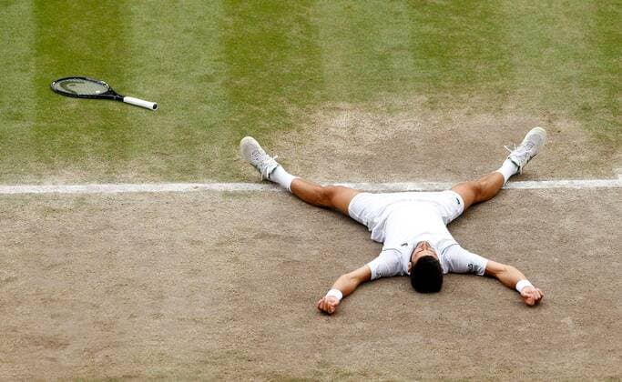 Mandatory Credit: Photo by Shutterstock (12204580an) Novak Djokovic of Serbia celebrates on match point Wimbledon Tennis Championships, Day 13, The All England Lawn Tennis and Croquet Club, London, UK - 11 Jul 2021 Wimbledon Tennis Championships, Day 13, The All England Lawn Tennis and Croquet Club, London, UK - 11 Jul 2021  Copyright: xShutterstockx 12204580an