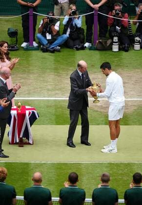 Mandatory Credit: Photo by Shutterstock (12204579ff) Novak Djokovic is presented with the trophy by The Duke of Kent after victory in the Gentlemen s Singles final Wimbledon Tennis Championships, Day 13, The All England Lawn Tennis and Croquet Club, London, UK - 11 Jul 2021 Wimbledon Tennis Championships, Day 13, The All England Lawn Tennis and Croquet Club, London, UK - 11 Jul 2021  Copyright: xShutterstockx 12204579ff