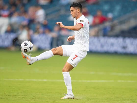 KANSAS CITY, KS - JULY 11: Canada midfielder Stephen Eustaquio (7) attempts to gain control of the ball during the CONCACAF Gold Cup match between Canada and Martinique on Sunday, July 11, 2021 at Children™s Mercy park in Kansas City, KS. (Photo by Nick Tre. Smith Icon Sportswire) SOCCER: JUL 11 Concacaf Gold Cup - Canada v Martinique Icon2107110038