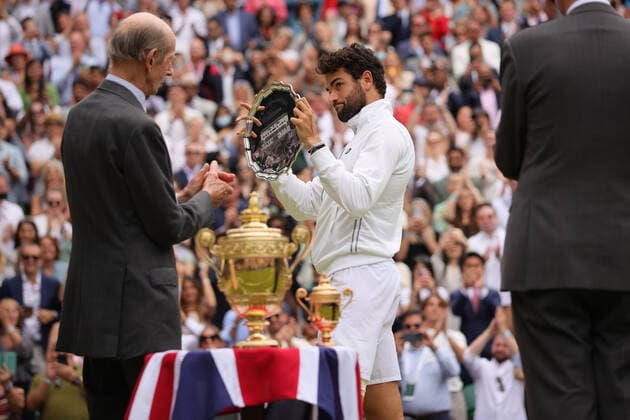(210712) -- LONDON, July 12, 2021 -- Matteo Berrettini (R)of Italy celebrates with the trophy after the men s final match between Novak Djokovic of Serbia and Matteo Berrettini of Italy at Wimbledon tennis Championship in London, Britain, on July 11, 2021. (Photo by Xinhua) (SP)BRITAIN-LONDON-TENNIS-WIMBLEDON-MEN S FINAL TimxIreland 