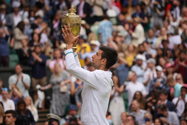 (210712) -- LONDON, July 12, 2021 -- Novak Djokovic of Serbia celebrates with the trophy after winning the men s final match between Novak Djokovic of Serbia and Matteo Berrettini of Italy at Wimbledon tennis Championship in London, Britain, on July 11, 2021. (Photo by Xinhua) (SP)BRITAIN-LONDON-TENNIS-WIMBLEDON-MEN S FINAL TimxIreland 