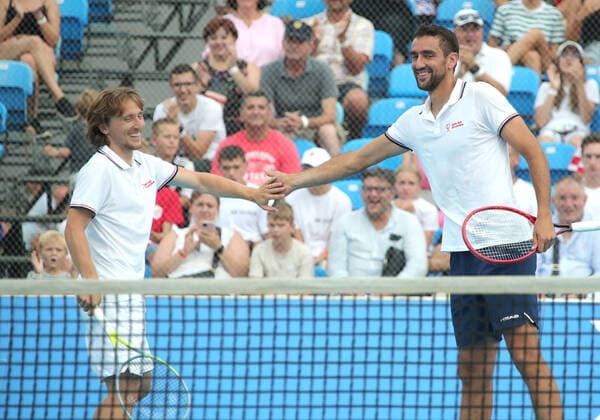 Bilder des Jahres 2021, Sport 07. Juli Sport Themen der Woche KW28 Sport Bilder des Tages Gem Set Hrvatska - Top Croatian Stars Play Tennis For Petrinja PETRINJA, CROATIA - JULY 13: Footballer Luka Modric and tennis player Marin Cilic during humanitarian event by the Marin Cilic Foundation Gem Set Hrvatska on July 13, 2021 in Petrinja, Croatia. Top Croatian stars play tennis to raise funds for new sporting facilities, which was badly affected by earthquakes in December 2020. SanjinxStrukic PIXSELL