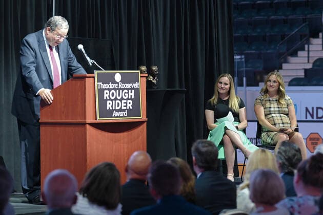 July 14, 2021: Senior Advisor to the CEO of Comcast Corporation, David Cohen addresses the crowd before North Dakota Governor Doug Burgum presents the state s highest honor, the Theodore Roosevelt Rough Rider Award to olympic gold medalists Monique Lamoureux-Morando (left) and twin sister Jocelyne Lamoureux-Davidson (right) during a ceremony at the Ralph Engelstad Arena, Grand Forks, ND. CSM Grand Forks USA - ZUMAc04_ 20210714_zaf_c04_018 Copyright: xRussellxHonsx