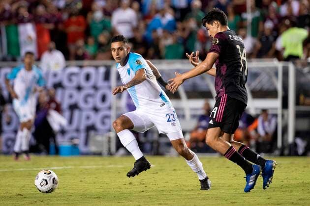 Jorge Aparicio (L) of Guatemala vies for the ball with Erick Gutierrez of Mexico during the Gold Cup group phase soccer match at Cotton Bowl stadium in Dallas, USA, 14 July 2021. Guatemala vs. Mexico !ACHTUNG: NUR REDAKTIONELLE NUTZUNG!  Copyright: xCarlosxRamírezx AMDEP7235 20210715-116e76d684f83d24ca5de47a25eec2d6a0078497