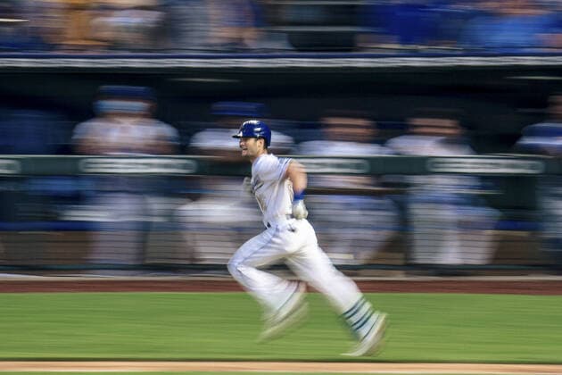 Kansas City Royals left fielder Andrew Benintendi (16) connects with a Baltimore Orioles pitch in the fifth inning at Kaufman Stadium in Kansas City, Missouri on Friday, July 16, 2021.  KCP20210716127 KYLExRIVAS