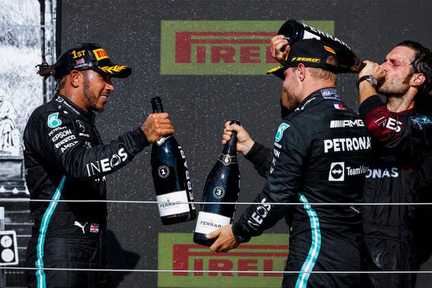 HAMILTON Lewis (gbr), Mercedes AMG F1 GP W12 E Performance, BOTTAS Valtteri (fin), Mercedes AMG F1 GP W12 E Performance, on the podium during the Formula 1 Pirelli British Grand Prix 2021, 10th round of the 2021 FIA Formula One World Championship, WM, Weltmeisterschaft from July 16 to 18, 2021 on the Silverstone Circuit, in Silverstone, United Kingdom - FORMULE 1 : Grand prix de Grande Bretagne - Course - Silverstone - 18 07 2021 DPPI PANORAMIC  _V2_5604