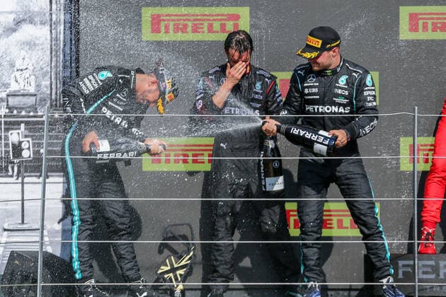 FORMULA 1 BRITISH GRAND PRIX, 18 07 2021 Silverstone Circuit,18 July 2021 Lewis Hamilton (GBR), Mercedes AMG Petronas W12 celebrates on the podium after winning with Valtteri Bottas (FIN), Mercedes AMG Petronas W12 during the FORMULA 1 PIRELLI BRITISH GRAND PRIX RACE at Silverstone, United Kingdom Editorial Use Only Copyright: xPhilxDuncanx ESM-0061-0006
