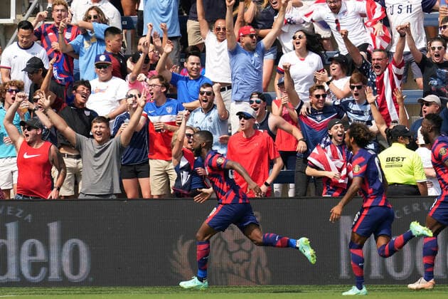 KANSAS CITY, KS - JULY 18: United States defender Shaq Moore (20) celebrates with fans and teammates after scoring a goal in action during the CONCACAF Gold Cup Group B match between the United States and Canada on July 18, 2021 at Children s Mercy Park in Kansas City, KS. (Photo by Robin Alam Icon Sportswire) SOCCER: JUL 18 Concacaf Gold Cup - USA v Canada Icon164210718001