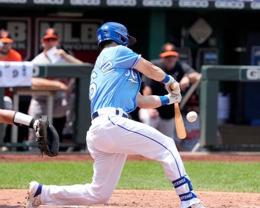 July 18, 2021: Kansas City Royals Andrew Benintendi (16)goes down to a knee to make contact with a pitch at Kauffman Stadium in Kansas City, MO. Orioles defeated the Royals 5-0. CSM. Kansas City United States - ZUMAc04_ 20210718_zaf_c04_029 Copyright: xJonxRobichaudx