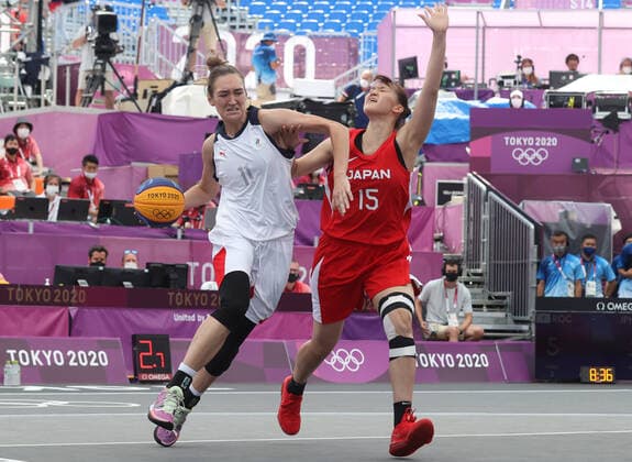 TOKYO, JAPAN - JULY 24, 2021: ROC Team s Anastasiia Logunova (L) and Japan s Risa Nishioka are in action in their women s 3x3 basketball pool round match during the 2020 Summer Olympic Games, Olympische Spiele, Olympia, OS at Aomi Urban Sports Park. Stanislav Krasilnikov TASS  TS1091BB