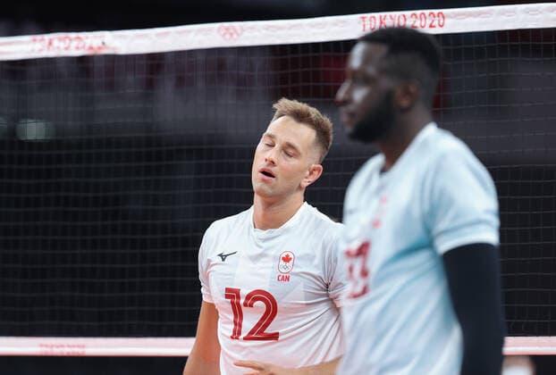 (210724) -- DONGJING, July 24, 2021 -- Lucas van Berkel reacts during the men s volleyball preliminary round match between Italy and Canada at Tokyo 2020 Olympic Games, Olympische Spiele, Olympia, OS in Tokyo, July 24, 2021. ) (TOKYO2020)JAPAN-TOKYO-OLY-MEN-VOLLEYBALL DingxTing 
