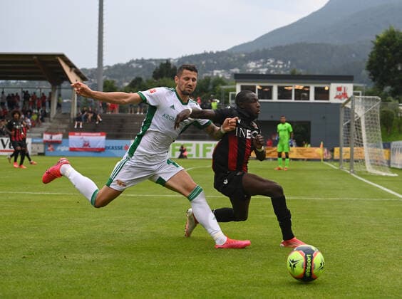 Fussball, Herren, Saison 2021 2022, Testspiel in Imst (Österreich), 1. FC Union Berlin - OGC Nizza, v. l. Pawel Wszolek (1. FC Union Berlin), Hassane Kamara (OGC Nizza), 24.07. 2021, Copyright: xMatthiasxKochx