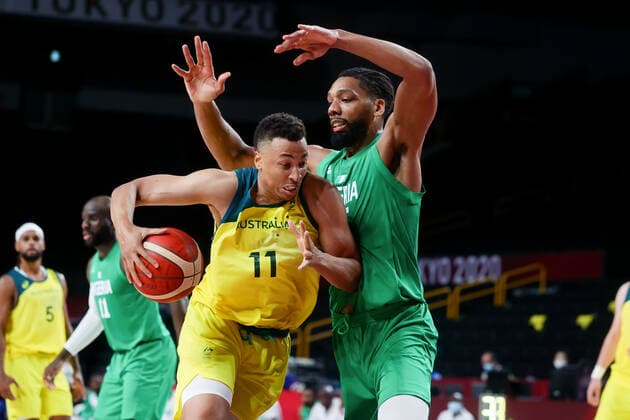 TOKYO, JAPAN - JULY 25: Dante Exum of Team Australia is blocked during the Men s Basketball preliminary Round Group B - Match 3 between Australia and Nigeria on Day 2 of the Tokyo 2020 Olympic Games, Olympische Spiele, Olympia, OS at Saitama Super Arena on July 25, 2021 in Tokyo, Japan. (Photo by Pete Dovgan Speed Media Icon Sportswire) OLYMPICS: JUL 25 Olympics Tokyo 2020 Icon2107250064