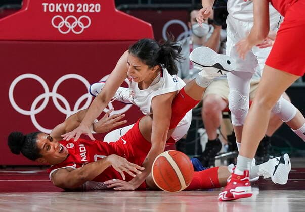 July 26, 2021, Tokyo, Japan: Team Canada forward Miranda Ayim (9) battles for the ball against Team Serbia forward Jelena Brooks (9) during second half Olympic basketball action at the Tokyo Olympics in Tokyo, Japan on Monday, July 26, 2021. Canada News - July 26, 2021  - ZUMAc35_ 20210726_zaf_c35_023 Copyright: xNathanxDenettex