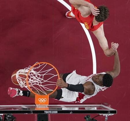 Tokyo Olympics: Basketball Rui Hachimura (bottom) dunks the ball during the second quarter of Japan s preliminary-round basketball game against Spain at the Tokyo Olympics on July 26, 2021, at Saitama Super Arena near Tokyo.  A14AA0000754560P