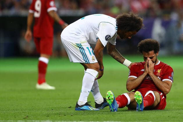 Mandatory Credit: Photo by Kieran Mcmanus BPI Shutterstock (9694071dg) Mohamed Salah of Liverpool cures on the pitch shortly before being substituted Real Madrid v Liverpool, UEFA Champions League Final, Olimpiyskiy National Sports Complex Stadium, Kiev, UA, 26 May 2018 Real Madrid v Liverpool, UEFA Champions League Final, Olimpiyskiy National Sports Complex Stadium, Kiev, UA, 26 May 2018 Copyright: xKieranxMcmanus BPI Shutterstockx 9694071dg