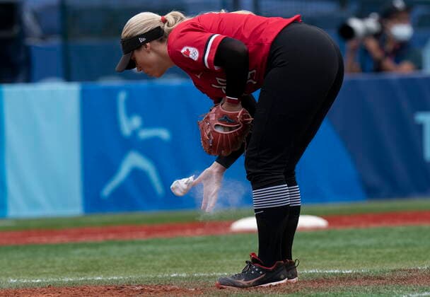July 27, 2021, Yokohama, Japan: Canadian softball pitcher Danielle Lawrie, from Langley, B.C. uses a chalk bag to dry her hand during the bronze medal game against Mexico at the 2020 Tokyo Olympics, Tuesday, July 27, 2021 in Yokohama, Japan. Canada News - July 27, 2021 - ZUMAc35_ 20210727_zaf_c35_025 Copyright: xThexCanadianxPressx
