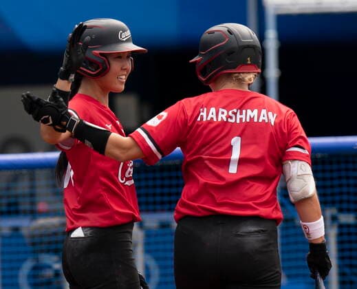 July 27, 2021, Yokohama, Japan: Canadaâ€⠢s softball player Janet Leung, from Mississauga, Ont. (left) celebrates with Kelsey Harshman, from Delta, B.C. after scoring the game-winning run on a sacrifice fly during the bronze medal game against Mexico at the Tokyo Olympics, Tuesday, July 27, 2021 in Yokohama, Japan. Canada News - July 27, 2021 - ZUMAc35_ 20210727_zaf_c35_030 Copyright: xThexCanadianxPressx