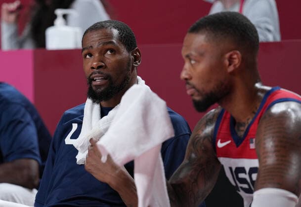 (210728) -- TOKYO, July 28, 2021 -- Kevin Durant (L) communicates with Damian Lillarad of the United States during the men s preliminary round match of basketball between the United States and Iran at Tokyo 2020 Olympic Games, Olympische Spiele, Olympia, OS in Saitama, Japan, July 28, 2021. ) (TOKYO2020)JAPAN-SAITAMA-OLY-BASKETBALL-MEN S PRELIMINARY MengxYongmin 
