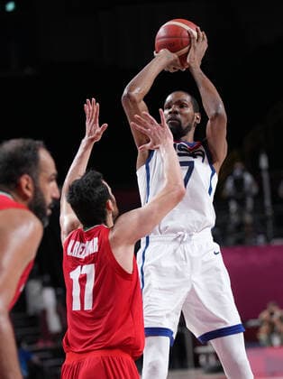 (210728) -- TOKYO, July 28, 2021 -- Kevin Durant (1st R) of United States reacts during the men s preliminary round match of basketball between the United States and Iran at Tokyo 2020 Olympic Games, Olympische Spiele, Olympia, OS in Saitama, Japan, July 28, 2021. ) (TOKYO2020)JAPAN-SAITAMA-OLY-BASKETBALL-MEN S PRELIMINARY MengxYongmin 