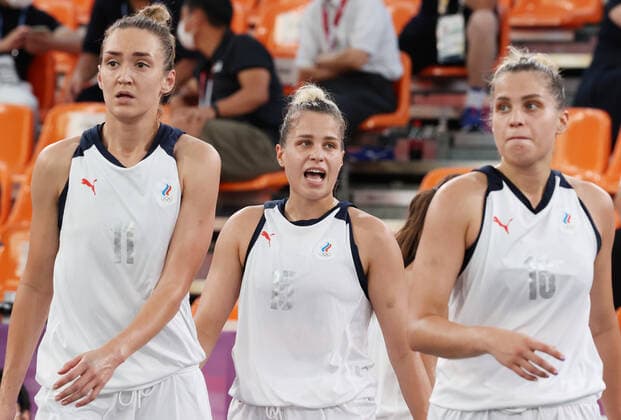 TOKYO, JAPAN - JULY 28, 2021: ROC s Anastasia Logunova, Olga Frolkina, and Yevgenia Frolkina (L-R) in their women s 3x3 basketball semifinal match against China during the Tokyo 2020 Summer Olympic Games, Olympische Spiele, Olympia, OS at the Aomi Urban Sports Park. Stanislav Krasilnikov TASS  TS109FFC