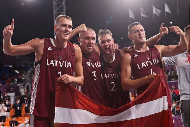 TOKYO, JAPAN - JULY 28, 2021: Latvia s players celebrate after winning their men s 3x3 basketball gold medal match against the ROC Team during the Tokyo 2020 Summer Olympic Games, Olympische Spiele, Olympia, OS at the Aomi Urban Sports Park. Stanislav Krasilnikov TASS  TS10A10E