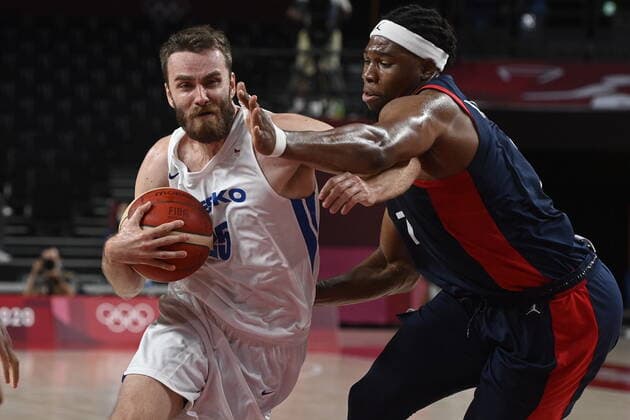 L-R David Jelinek of Czech and Guerschon Yabusele of France in action during the basketball Group A match Czech Republic vs. France in Tokyo 2020 Summer Olympics, Japan, July 28, 2021. (CTKxPhoto OndrejxDeml) CTKPhotoP2021072811757 
