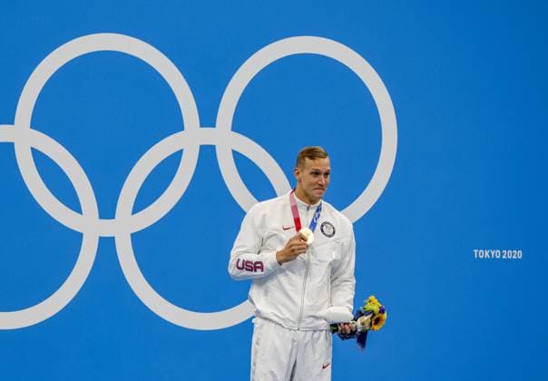 Caeleb Dressel of USA celebrates winning gold in the mens 100m freestyle with a time of 47:02 at the Tokyo Aquatics Center, during the Tokyo Summer Olympic Games, Olympische Spiele, Olympia, OS in Tokyo, Japan, on Thursday July 29, 2021.  OLY20210729466 TASOSxKATOPODIS