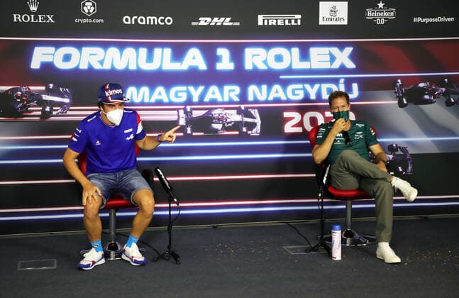 F1 Grand Prix of Hungary 14 Fernando Alonso (ESP, Alpine F1 Team), 5 Sebastian Vettel (GER, Aston Martin Cognizant F1 Team), F1 Grand Prix of Hungary at Hungaroring on July 29, 2021 in Budapest, Hungary. (Photo by Florion Goga REUTERS FIA Pool via HOCH ZWEI) Budapest Hungary Poolfoto HOCH ZWEI Pool REUTERS ,EDITORIAL USE ONLY