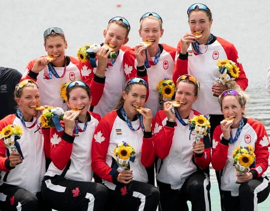 July 30, 2021, Tokyo, Japan: Canadaâ€⠢s Lisa Roman, Kasia Gruchalla-Wesierski, Christine Roper, Andrea Proske, Susanne Grainger, Madison Mailey, Sydney Payne, Avalon Wasteneys and Kristen Kit celebrate on the podium after winning the gold medal in womenâ€⠢s eight rowing competition at the Tokyo Olympics, Friday, July 30, 2021 in Tokyo, Japan. Lisa Roman Kasia Gruchalla-Wesierski Christine Roper Andrea Proske Susanne Grainger Madison Mailey Sydney Payne Avalon Wasteneys - ZUMAc35_ 20210730_zaf_c35_009 Copyright: xAdrianxWyldx