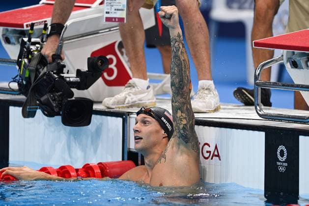 (210731) -- TOKYO, July 31, 2021 -- Caeleb Dressel of the United States celebrates after the men s 100m butterfly final at the Tokyo 2020 Olympic Games, Olympische Spiele, Olympia, OS in Tokyo, Japan, July 31, 2021. ) (TOKYO2020)JAPAN-TOKYO-OLY-SWIMMING-MEN-100M BUTTERFLY DuxYu 