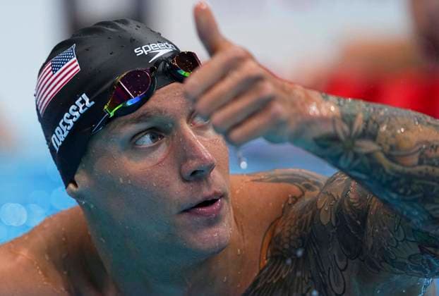 (210731) -- TOKYO, July 31, 2021 -- Caeleb Dressel of the United States reacts after the men s 50m freestyle semifinal of swimming at the Tokyo 2020 Olympic Games, Olympische Spiele, Olympia, OS in Tokyo, Japan, July 31, 2021. ) (TOKYO2020)JAPAN-TOKYO-OLY-SWIMMING-MEN S 50M FREESTYLE-SEMIFINAL XuxChang 