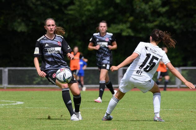 Nadja Burkard (1.FC Nuernberg 22) gegen Marion Rey (FC Basel 1893 15) GER , 1.FC Nuernberg (GER) vs. FC Basel 1893 (SUI) , Fussball , Frauen , Testspiel, Saison 2021 2022, 31.07.2021 DFL regulations prohibit any use of photographs as image sequences and or quasi-video. GER , 1.FC Nuernberg vs. FC Basel 1893 , Frauenfussball , Testspiel , Saison 2021 2022 , 31.07.2021 Boeblingen Copyright: xEibner-Pressefotox EP_TBR