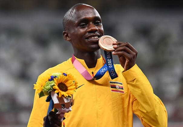 (210731) -- TOKYO, July 31, 2021 -- Bronze medalist Jacob Kiplimo of Uganda reacts on the awarding ceremony of the men s 10000m at the Tokyo 2020 Olympic Games, Olympische Spiele, Olympia, OS in Tokyo, Japan, July 31, 2021. ) (TOKYO2020)JAPAN-TOKYO-OLY-ATHLETICS-MEN S 10000M-AWARDING CEREMONY LixYibo 
