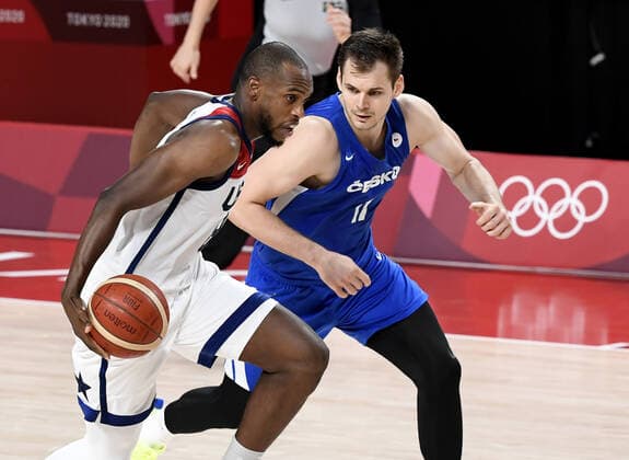 United States Khris Middleton is closely guarded by Czechoslovakia s Jaromir Bohacik during a Men s Basketball game at the Tokyo 2020 Olympics, Saturday, July 31, 2021, in Tokyo, Japan. USA won, 119-84. PhoKhris to by Mike Theiler UPI  OLY20210731831 MIKExTHEILER