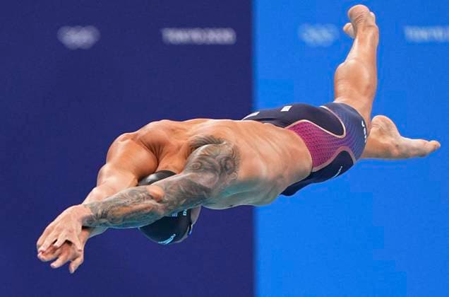 (210801) -- TOKYO, Aug. 1, 2021 -- Caeleb Dressel of the United States competes during the men s 50m freestyle final of swimming at the Tokyo 2020 Olympic Games, Olympische Spiele, Olympia, OS in Tokyo, Japan, Aug. 1, 2021. ) (TOKYO2020)XHTP-JAPAN-TOKYO-OLY-SWIMMING-MEN S 50M FREESTYLE-FINAL XuxChang 