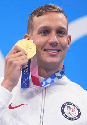 (210801) -- TOKYO, Aug. 1, 2021 -- Caeleb Dressel of the United States poses during the awarding ceremony after the men s 50m freestyle final of swimming at the Tokyo 2020 Olympic Games, Olympische Spiele, Olympia, OS in Tokyo, Japan, Aug. 1, 2021. ) (TOKYO2020)JAPAN-TOKYO-OLY-SWIMMING-MEN S 50M FREESTYLE-FINAL XuxChang 