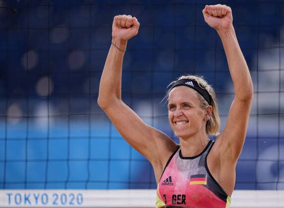 (210801) -- TOKYO, Aug. 1, 2021 -- Laura Ludwig of Germany celebrates after winning the women s Beach volleyball, Beachvolleyball round of 16 match between Margareta Kozuch Laura Ludwig of Germany and Agatha Bednarczuk Eduarda Santos Lisboa of Brazil at the Tokyo 2020 Olympic Games, Olympische Spiele, Olympia, OS in Tokyo, Japan, Aug. 1, 2021. ) (TOKYO2020)JAPAN-TOKYO-OLY-BEACH VOLLEYBALL-WOMEN S ROUND OF 16 LixHe 